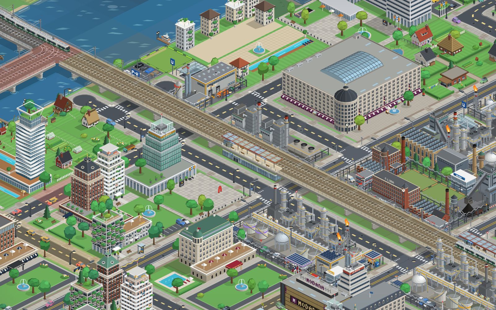 Railway line with trains and a station between industry and the city centre, next to an underground station with Park and Ride